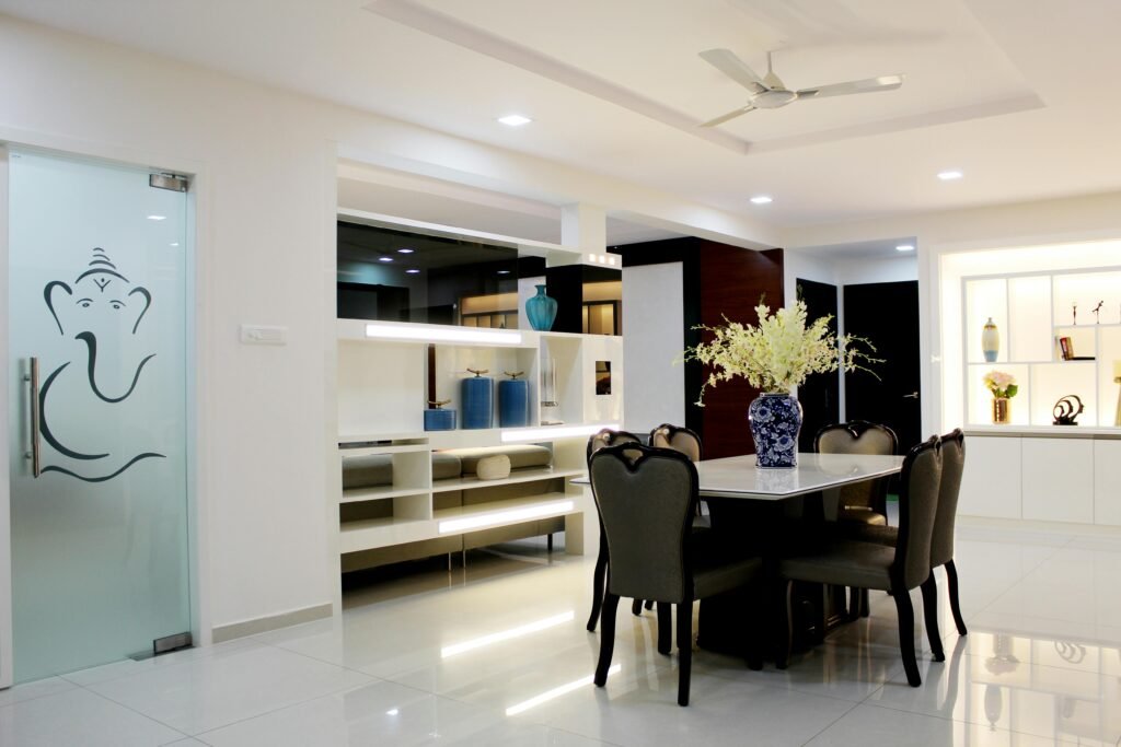 Elegant Hyderabad dining room with contemporary decor and Ganesh art.